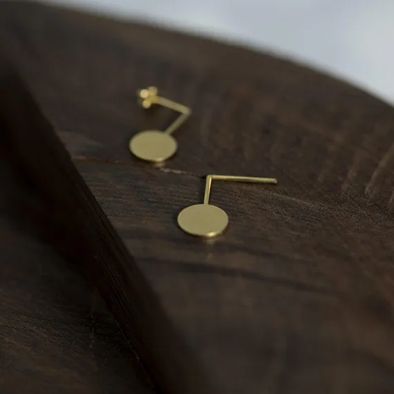 Gold circle graphic drop earrings N°10