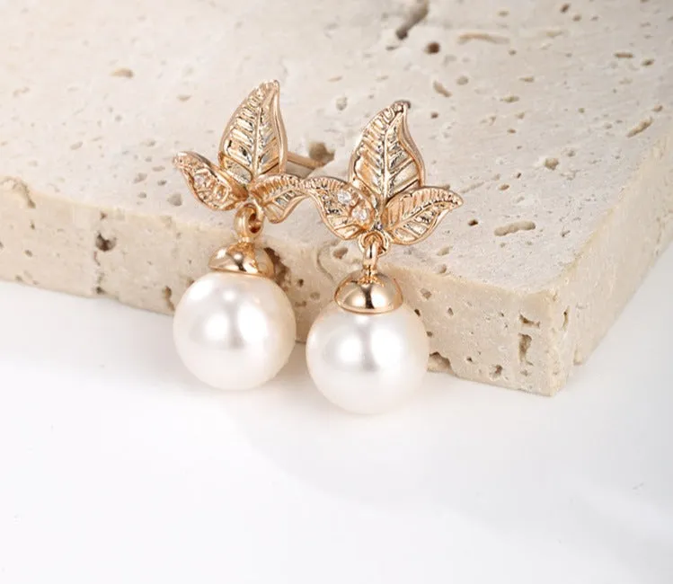 Jewelry simple and fashionable gold leaf imitation pearl earrings niche design high-end retro earrings